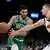 Jayson Tatum von den Boston Celtics zieht gegen Nikola Jokic von den Denver Nuggets mit Ball zum Korb