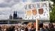 Demonstration against racism in Cologne in 2020, protester holding up a sign reading: "we are all the same!" Demonstration against racism in Cologne in 2020, protester holding up a sign reading: "we are all the same!"
