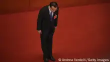 BEIJING, CHINA - MAY 22: Chinese Premier Li Keqiang bows at the end of his speech during the opening of the National People's Congress at The Great Hall Of The People on May 22, 2020 in Beijing, China. China is holding now its annual Two Sessions political meetings, that were delayed since March due to the Covid19 outbreak. (Photo by Andrea Verdelli/Getty Images)