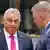 Hungarian Prime Minister Viktor Orban (left) grimaces as he speaks to his Slovak counterpart, Robert Fico (right), at the European summit in Brussels, Belgium, October 26, 2023
