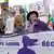 Mulheres em protesto pró-aborto na França carregam faixa com dizeres" as mulheres decidem"