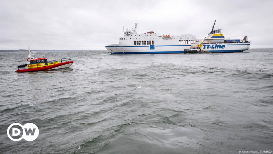 Grounded ferry off Swedish coast remains adrift, leaking oil