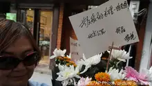 A pile of flowers is laid for former Chinese Premier Li Keqiang in front of the house he used to live in Hefei, the capital city of Anhui Province, China on Oct. 27, 2023. According to the Chinese state media, Li Keqiang, once seen as the country's top leadership role, died of a sudden heart attack in Shanghai on the previous day. He was 68 years old. ( The Yomiuri Shimbun via AP Images )