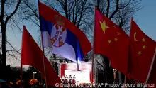 22.02.2020+++ People wave Chinese and Serbian flags during a concert at Belgrade's Kalemegdan Fortress, Serbia, Saturday, Feb. 22, 2020. Several dozen people have attended a concert in Serbia in support of China in its struggle to contain a new virus that started in the Asian country but has spread globally. (AP Photo/Darko Vojinovic)