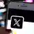 Логотип X на экране смартфона