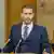 Kryeministri i ri malazez Millojko Spajiq duke folur para mikrofonit