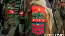In this photo taken on March 9, 2023 the logo of the ethnic rebel group Ta'ang National Liberation Army (TNLA) is pictured on a member's uniform near Namhsan Township in Myanmar's northern Shan State. (Photo by AFP) (Photo by STR/AFP via Getty Images)