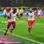 Dayot Upamecano and Harry Kane celebrate Bayern's opening goal