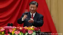 Chinese President Xi Jinping makes a toast to leaders and invited guests after delivering his speech at a dinner marking the 74th anniversary of the founding of the People's Republic of China at the Great Hall of the People in Beijing, Thursday, Sept. 28, 2023. (AP Photo/Andy Wong, Pool)