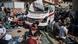 Palestinians perform Friday prayer near a destroyed ambulance in the courtyard of Nasser Hospital in Khan Yunis Palestinians perform Friday prayer near a destroyed ambulance in the courtyard of Nasser Hospital in Khan Yunis