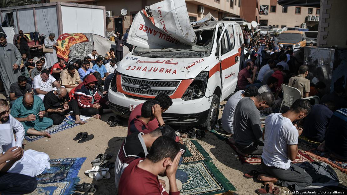 Palestinians perform Friday prayer as Israeli attacks continue on 35th day at the courtyard of Nasser Hospital on Khan Yunis, 