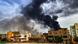 Smoke plumes billow from a fire in southern Khartoum amidst ongoing fighting Smoke plumes billow from a fire in southern Khartoum amidst ongoing fighting