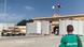 A Russian emergency worker waits on the Egyptian side of the Rafah border crossing A Russian emergency worker waits on the Egyptian side of the Rafah border crossing
