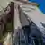 Зруйнован стіну будівлі Херсонскої обласної військуової адміністрації на свято завісили патріотичним банером