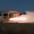 Предоставленная ЦТАК фотография, на которой, как утверждается, зафиксировано испытание твердотопливного ракетного двигателя