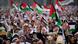 Protesters shout slogans and wave Palestinian flags during a rally in support of the Palestinians at the National Monument in Jakarta, Indonesia Protesters shout slogans and wave Palestinian flags during a rally in support of the Palestinians at the National Monument in Jakarta, Indonesia