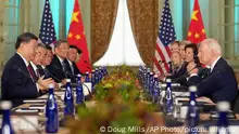 President Joe Biden listens as China's President President Xi Jinping speaks during their meeting at the Filoli Estate in Woodside, Calif., Wednesday, Nov, 15, 2023, on the sidelines of the Asia-Pacific Economic Cooperative conference. (Doug Mills/The New York Times via AP, Pool)