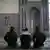A file photo of three men at the Chorweiler Mosque in Cologne in 2015