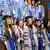 حضور دانش‌آموختگان پردیس بین‌الملل دانشگاه صنعتی شریف در جزیره کیش بدون حجاب اجباری در مراسم فارغ‌التحصیلی