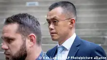 21/11/2023 *** Binance founder and CEO Changpeng Zhao, right, leaves federal court in Seattle, Tuesday, Nov. 21, 2023, after pleading guilty to violations of U.S. anti-money laundering laws. (Ken Lambert/The Seattle Times via AP)