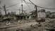 A car passes drives through an area destroyed after a strike in the city of Avdiivka, Donetsk region A car passes drives through an area destroyed after a strike in the city of Avdiivka, Donetsk region