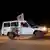 Автомобиль Красного Креста перевозит заложников, освобожденных ХАМАС 24 ноября