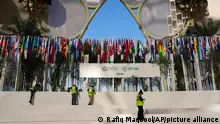 Workers prepare an area at the COP28 U.N. Climate Summit, Thursday, Nov. 30, 2023, in Dubai, United Arab Emirates. (AP Photo/Rafiq Maqbool)