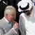 Britain's King Charles talks with Qatar's Emir Sheikh Tamim Bin Hamad Al Thani