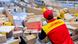 A worker moves parcels at a DHL facility in Germany A worker moves parcels at a DHL facility in Germany