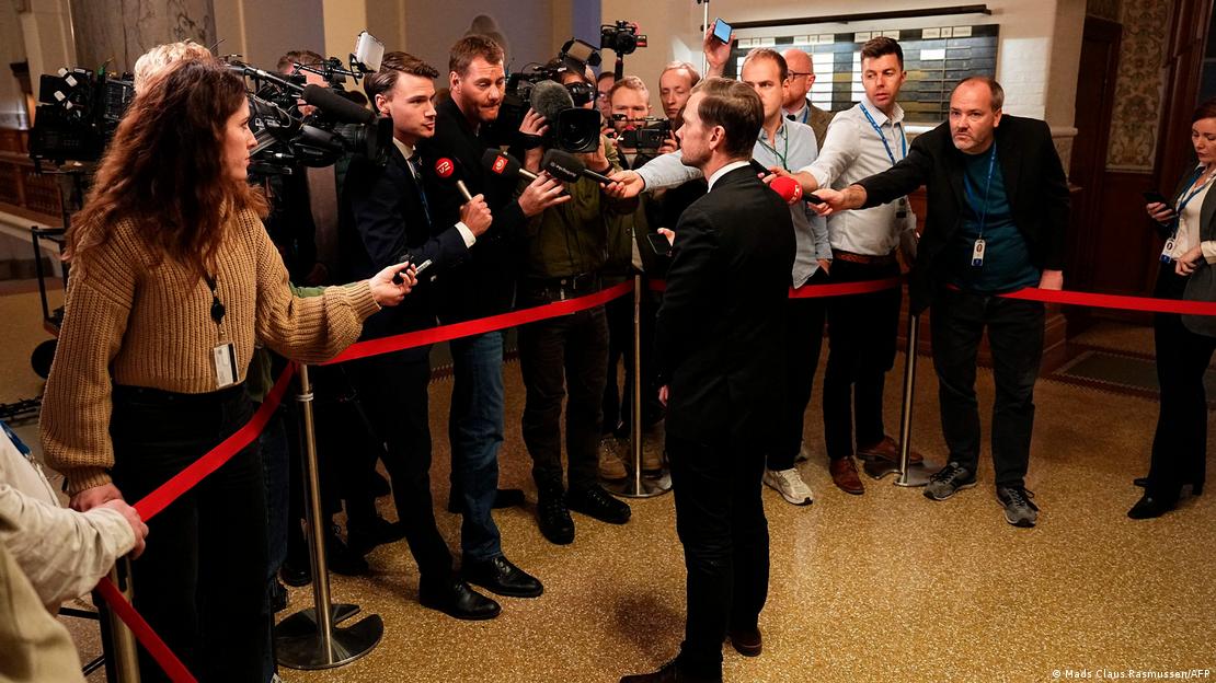 Denmark's Minister of Justice speaks to the media after the passage of a Quran burning law 