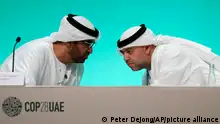 COP28 President Sultan al-Jaber, left, and COP28 Director-General Ambassador Majid Al Suwaidi talk at the COP28 U.N. Climate Summit, Thursday, Nov. 30, 2023, in Dubai, United Arab Emirates. (AP Photo/Peter Dejong)