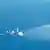 Sebuah kapal penjaga pantai Cina menggunakan meriam air