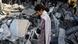 A girl inspects the damage to a residential building in Al-Zawayda, in the central Gaza Strip, following an Israeli airstrike A girl inspects the damage to a residential building in Al-Zawayda, in the central Gaza Strip, following an Israeli airstrike