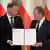 Prezydent Duda i premier Tusk podczas zaprzysiężenia rządu