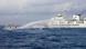A Chinese Coast Guard boat sprays a water cannon at a Philippine boat near Second Thomas Shoal A Chinese Coast Guard boat sprays a water cannon at a Philippine boat near Second Thomas Shoal