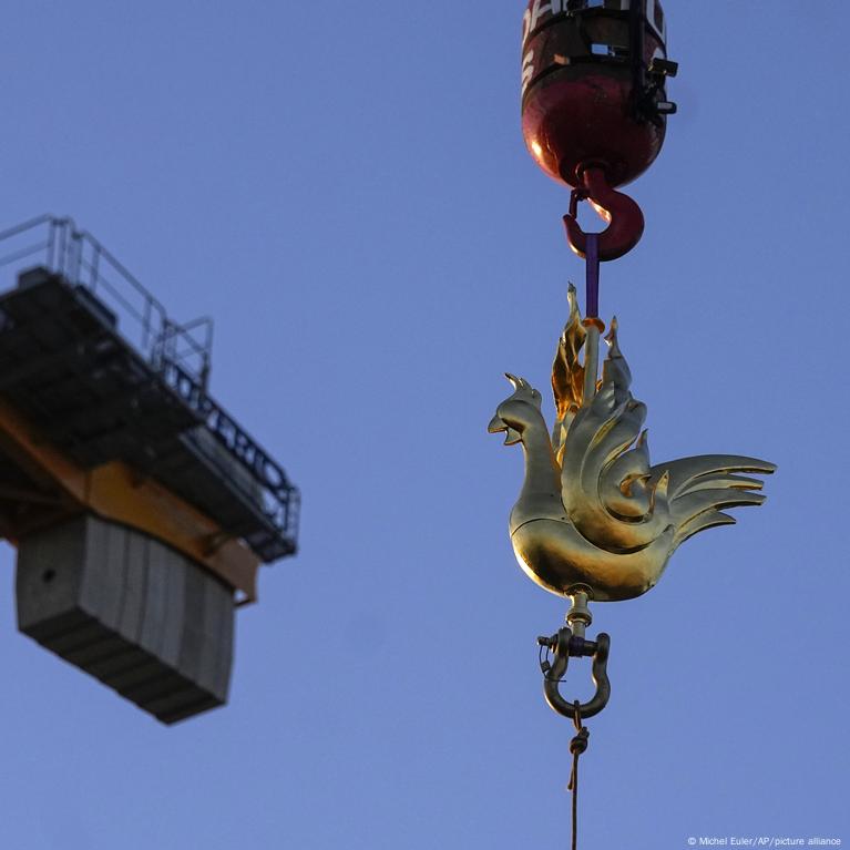 Ruling the roost! Notre Dame cathedral is adorned with brand new golden  rooster reimagined as a phoenix four years after fire devastated the iconic  Parisian landmark