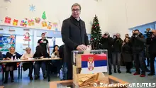 Serbian President Aleksandar Vucic casts his vote at a polling station during the parliamentary election in Belgrade, Serbia, December 17, 2023. REUTERS/Zorana Jevtic