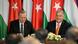 Turkish President Recep Tayyip Erdogan (l) and Hungarian Prime Minister Viktor Orban (r) smile while seated at a table flanked by their nations' flags Turkish President Recep Tayyip Erdogan (l) and Hungarian Prime Minister Viktor Orban (r) smile while seated at a table flanked by their nations' flags