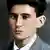 A colorized photo of Franz Kafka.