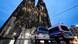 Police officers control the start of early mass on Christmas Day at the entrance to Cologne Cathedral. Police officers control the start of early mass on Christmas Day at the entrance to Cologne Cathedral.