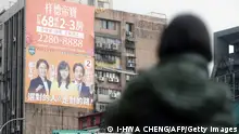 28/12/2023 An election campaign billboard showing Taiwan's ruling Democratic Progressive Party (DPP) presidential candidate Lai Ching-te (R), his running mate Hsiao Bi-khim (L), and legislative candidate Hsu Shu-Hua (C) is seen on a building near the Songshan train station in Taipei on December 28, 2023. (Photo by I-Hwa CHENG / AFP) (Photo by I-HWA CHENG/AFP via Getty Images) 