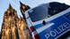 Полицейский автомобиль возле Кельнского собора Полицейский автомобиль возле Кельнского собора