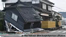 1/01/2024**A building collapses in Anamizu Town, Ishikawa Prefecture on Jan. 2, 2024. A strong earthquake with an estimated magnitude of 7.4 struck the Noto region of Ishikawa Prefecture, in central Japan, at around 4:10 p.m. Jan. 1st , registering 7 on the Japanese seismic intensity scale — the highest level — following an upper 5 seismic intensity scale earthquake four minutes earlier. ( The Yomiuri Shimbun via AP Images )