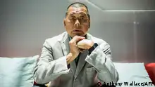 (FILES) In this picture taken on June 16, 2020, media tycoon Jimmy Lai poses during an interview with AFP at the Next Digital offices in Hong Kong. Hong Kong pro-democracy tycoon Jimmy Lai pleaded not guilty on January 2, 2024 to sedition and collusion charges in a high-profile national security trial that could see him jailed for life. (Photo by Anthony WALLACE / AFP)