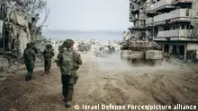 (240101) -- GAZA, Jan. 1, 2024 (Xinhua) -- The photo released by the Israel Defense Forces (IDF) on Jan. 1, 2024 shows Israeli troops conducting a military operation in Gaza Strip. Gaza has been under massive Israeli bombardment since Oct. 7, which has so far killed more than 21,800 Palestinians, according to Gaza-based Health Ministry. The Israeli escalation came in retaliation for a surprise attack by Hamas on Oct. 7, during which Hamas militants killed about 1,200 in Israel and took away more than 200 as hostages, according to Israeli tallies. (Israel Defense Forces/Handout via Xinhua)
