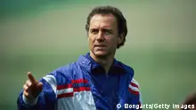 German football manager and former footballer Franz Beckenbauer, manager of the West Germany national team, wearing a red, white and blue tracksuit top during a West Germany training session, circa 1988. (Photo by Bongarts/Getty Images)