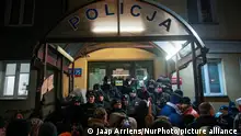 Protesters are seeen scuffling at the Grochow police station in Warsaw, Poland on 09 January, 2023. Scuffles between protesters and police erupted after supporters of two detained opposition MPs tried to breack into a police station. Maciej Wasik and Mariusz Kaminski on Tuesday were arrested on charges of abuse of power at the Presidential Palace where they sought refuge. (Photo by Jaap Arriens/NurPhoto)