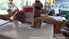 17.04.2019
PALEMBANG, INDONESIA - APRIL 17: Indonesian visually impaired person casts his vote during the general election at polling station in Palembang, Indonesia on April 17, 2019. Indonesians people cast their votes to elect the president, vice president and members of the House of Representatives as well as Regional Representative Council. Muhammad A.F / Anadolu Agency