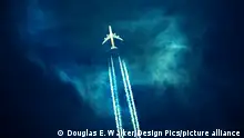 17.12.2015 Commercial Airplane with Contrails in Dark Sky