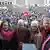 Немецкие политики на демонстрации против правых экстремистов в Потсдаме. В центре - канцлер ФРГ Олаф Шольц и глава МИД Анналена Бербок